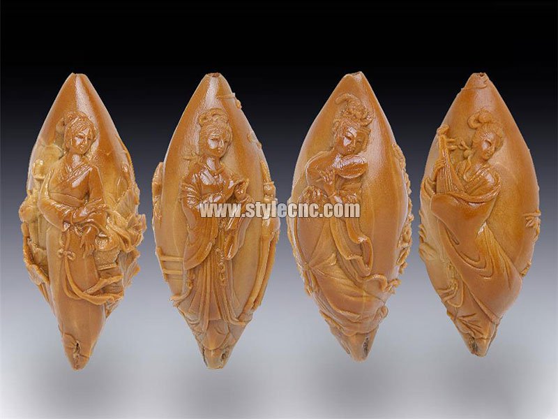 使用數(shù)控雕刻機(jī)對(duì)劣質(zhì)橄欖核進(jìn)行雕刻
